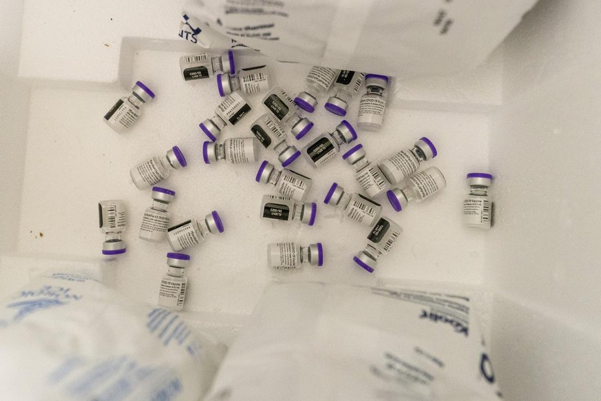 Vials with the Pfizer-BioNTech COVID-19 Vaccine are seen in a cooler before being thawed at a pop-up COVID-19 vaccination site at St. Luke&#039;s Episcopal Church, Tuesday, Jan. 26, 2021, in the Bronx ...