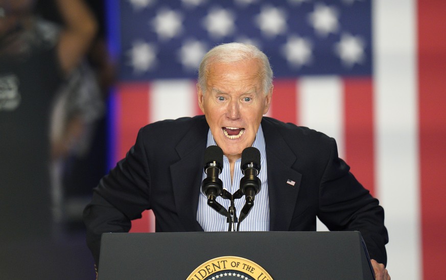 epa11461094 US President Joe Biden speaks about staying in the race for the presidency during a campaign stop at Sherman Middle School in Madison Wisconsin, USA, 05 July 2024. The president is facing  ...
