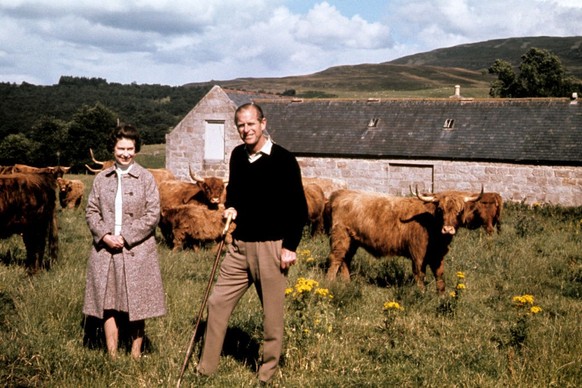 Queen Elizabeth II and the Duke of Edinburgh during a visit to a farm on their Balmoral estate, to celebrate their Silver Wedding anniversary. (Photo by PA Images via Getty Images)