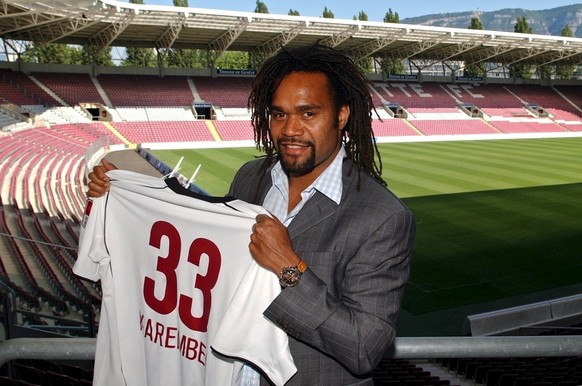 French soccer player Christian Karembeu, new player of Swiss soccer club Servette, poses for the photographers with his new jersey at the Geneva Stadium, in Geneva, Switzerland, Saturday, August 7, 20 ...