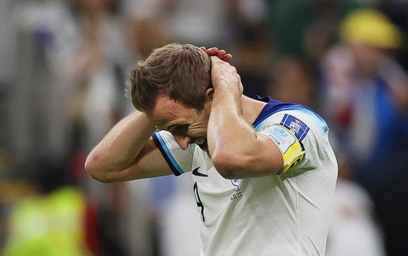 epaselect epa10360290 Harry Kane of England reacts after missing a penalty during the FIFA World Cup 2022 quarter final soccer match between England and France at Al Bayt Stadium in Al Khor, Qatar, 10 ...