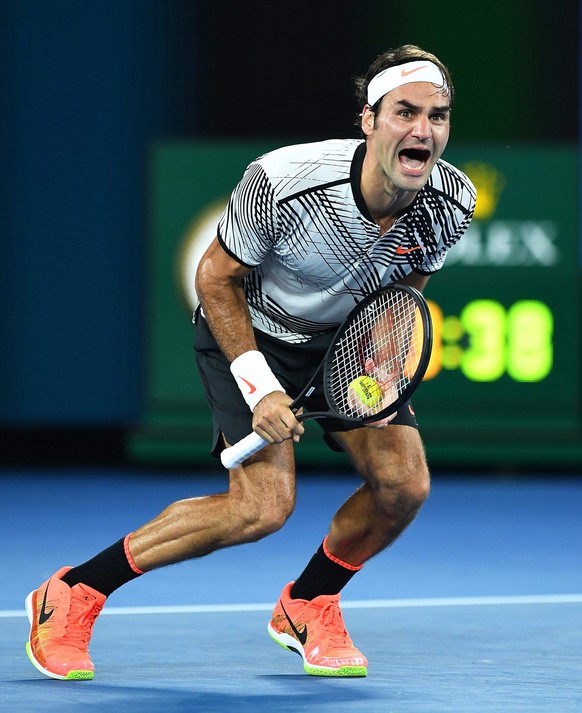 ARCHIV - RUECKTRITT ROGER FEDERER - MEILENSTEINE ROGER FEDERER - 2017 - MELBOURNE: SIEG AM AUSTRALIAN OPEN NACH LANGER VERLETZUNGSPAUSE - ZU DEN MEILENSTEINEN VON DER KARRIERE UND IM LEBEN VON ROGER F ...