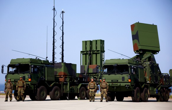epa11584522 Vehicles of the IRIS-T SLM air defense system from Diehl Defence are stationed on the grounds, during the ceremonial commissioning at the Todendorf barracks in Todendorf, Northern Germany, ...
