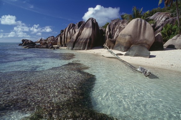 Anse Source d'Argent beach dotted with granite boulders, La Digue island, Seychelles.