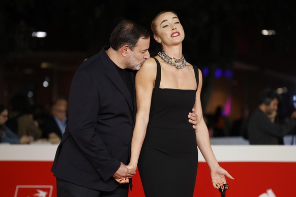 epa11665053 Italian director Fausto Brizzi (L) and Silvia Salis arrive for the screening of the movie &#039;Paradiso in Vendita&#039; at the 19th annual Rome International Film Fest in Rome, Italy, 17 ...
