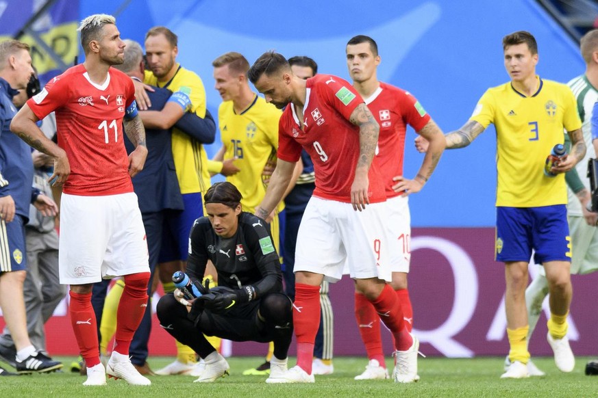 From left, Switzerland&#039;s midfielder Valon Behrami, Switzerland&#039;s goalkeeper Yann Sommer, Switzerland&#039;s forward Haris Seferovic and Switzerland&#039;s midfielder Granit Xhaka look disapp ...