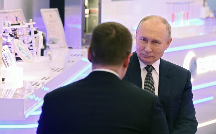 Russian President Vladimir Putin answers questions during an interview with correspondent of Rossiya 1 TV channel Pavel Zarubin in Moscow, Russia, 14 February 2024.
