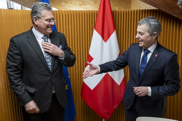Maros Sefcovic, EU Commissioner for Trade and Economic Security, left, shakes hands with Switzerland&#039;s Foreign Minister Federal Councillor Ignazio Cassis, right, prior to a bilateral meeting on t ...