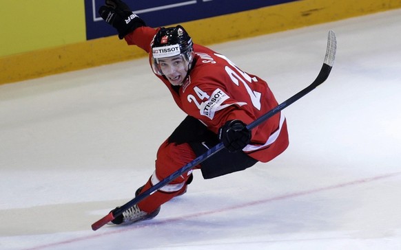 Switzerland&amp;#039;s Reto Suri celebrates his goal, after scored the 3:0, during the IIHF Ice Hockey World Championships semifinal match Switzerland vs USA at the Globe Arena in Stockholm, Sweden, o ...