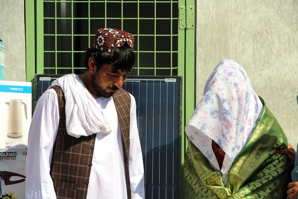 epa12704742 An Afghan couple attends a mass wedding ceremony at the Muhammadi Grand Mosque, in Gereshk, Helmand province, Afghanistan, 04 February 2026. In Afghanistan, mass weddings have become a vit ...