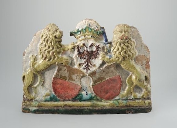 Les armes de la Ville de Lausanne, tenues par deux lions et surmontées d'une couronne, 1550-1620.
