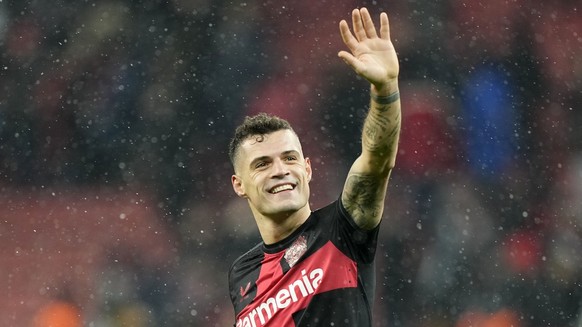 Leverkusen&#039;s Granit Xhaka waves to supporters after during the German Bundesliga soccer match between Bayer Leverkusen and Borussia Dortmund at the BayArena in Leverkusen, Germany, Sunday, Dec. 3 ...