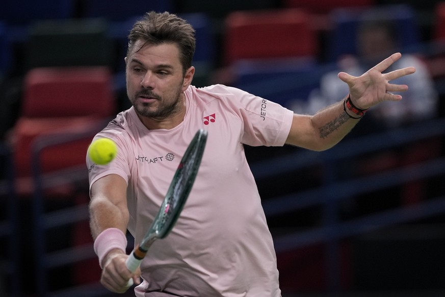 Stan Wawrinka of Switzerland returns a shot to Flavio Cobolli of Italy during the men&#039;s singles second round match in the Shanghai Masters tennis tournament at Qizhong Forest Sports City Tennis C ...