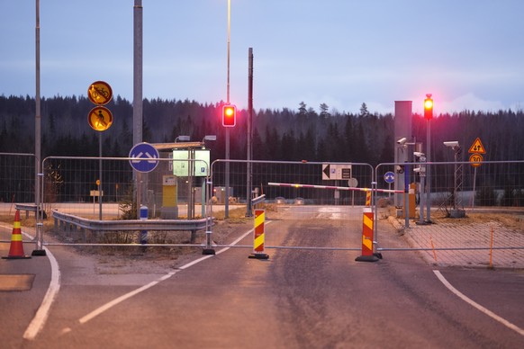 A fence is blocking the road to the closed empty Nuijamaa border station between Russia and Finland in Lappeenranta, Finland, Saturday, Nov. 18, 2023. Finland closed four crossing points on its long b ...