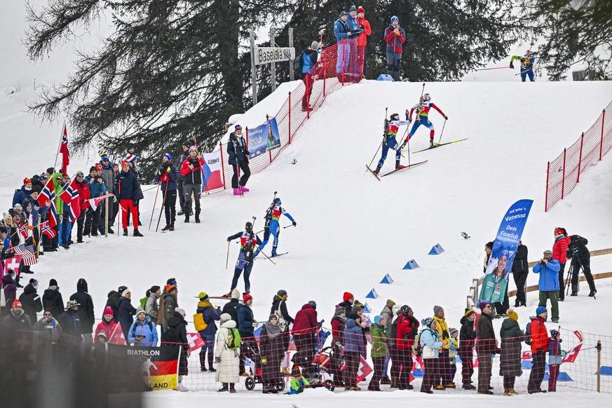 Spectators watch the women&#039;s 10km pursuit race at the IBU European Open Biathlon Championships, on Saturday, January 28, 2023, in Lenzerheide, Switzerland. (KEYSTONE/Gian Ehrenzeller)