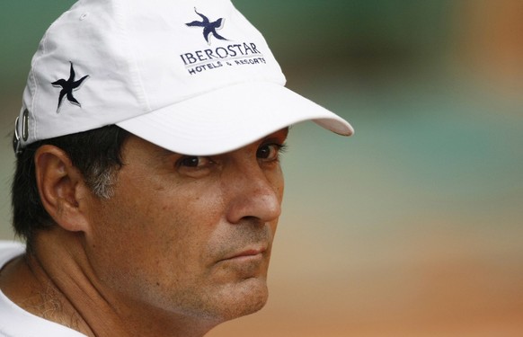 The coach of Spain's Rafael Nadal, Toni Nadal, watches during a training session at the French Open tennis tournament in Paris on Monday June 2, 2008. (AP Photo/Michel Spingler)