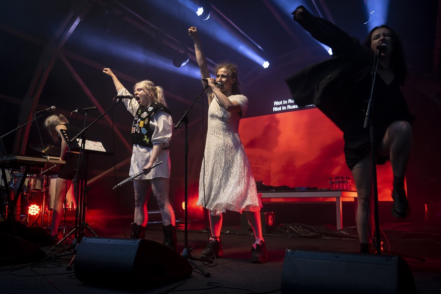 epa10148133 Russian political activists and members of the group Pussy Riot (L-R), Diana Burkot, Taso Pletner, Maria Alyokhina, and Olga Borisova, perform on stage during a concert at the Muehle Hunzi ...