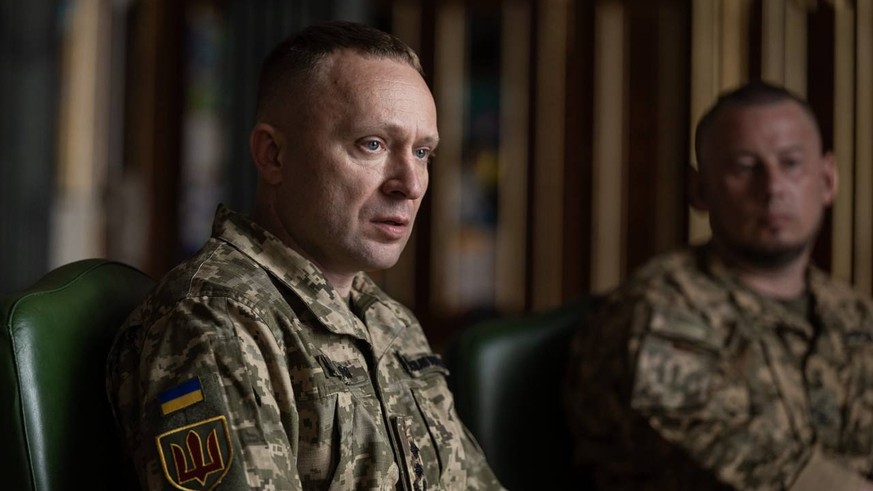 In this photo provided by the Ukrainian Presidential Press Office, new commander-in-chief of Ukraine's Armed Forces Mykhailo Drapatyi looks on during his meeting with Ukrainian President Volodymy ...