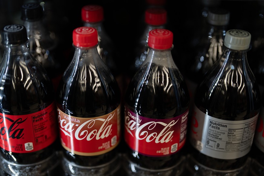 Bottles of Coca-Cola products are displayed for sale at Hawthorne Market on Tuesday, Jan. 6, 2026, in Portland, Ore. (AP Photo/Jenny Kane)
Earns Coca Cola