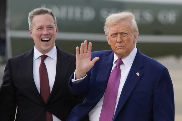 President Donald Trump waves as Secretary of the U.S. Army Daniel Driscoll watches at Pope Army Airfield at Fort Bragg, Tuesday, June 10, 2025, in Fort Bragg, N.C. (AP Photo/Alex Brandon)
Donald Trump