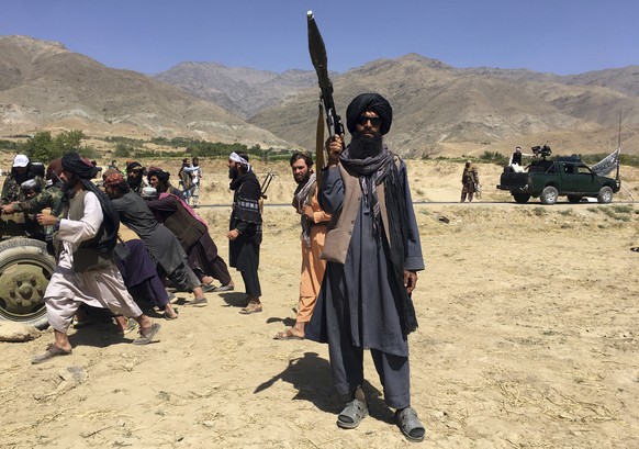 Taliban soldiers stand guard in Panjshir province northeastern of Afghanistan, Wednesday, Sept. 8, 2021. (AP Photo/Mohammad Asif Khan)