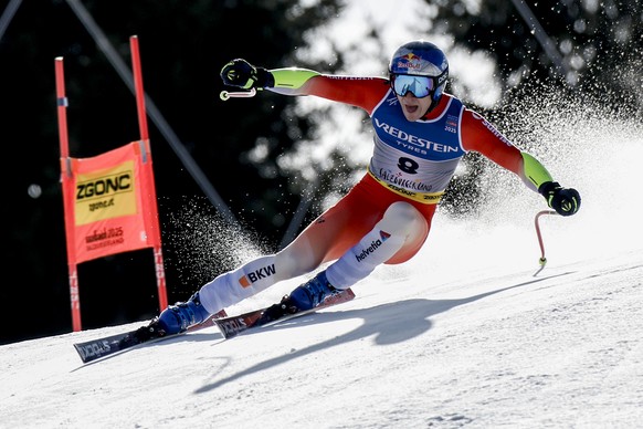 Switzerland&#039;s Marco Odermatt speeds down the course during a men&#039;s Super-G, at the Alpine Ski World Championships, in Saalbach-Hinterglemm, Austria, Friday, Feb. 7, 2025. (AP Photo/Gabriele  ...
