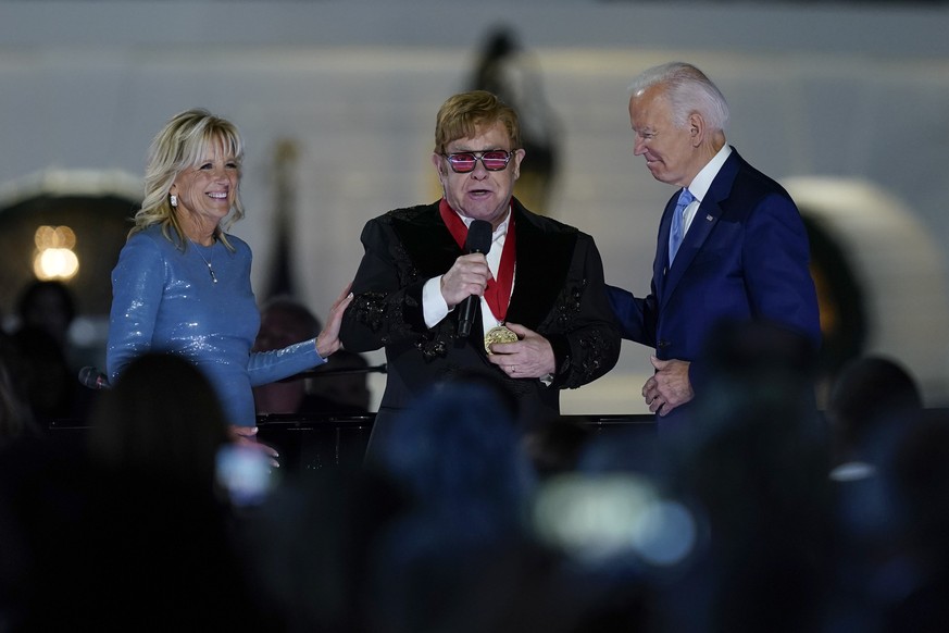 Elton John speaks after President Joe Biden presented him with the National Humanities Medal after a concert on the South Lawn of the White House in Washington, Friday, Sept. 23, 2022, as first lady J ...