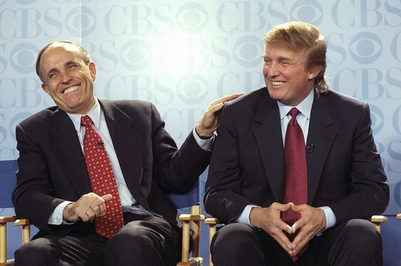 UNITED STATES - MAY 04: Mayor Rudy Giuliani and Donald Trump at news conference at the GM Building, where CBS announced that Bryant Gumbel will be the host of its new morning news program, &quot;This  ...
