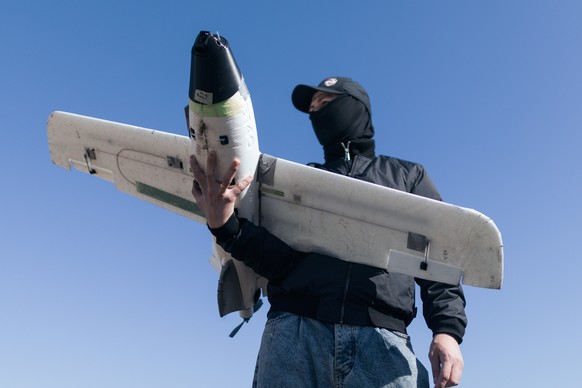 A soldier of the 127th Separate Territorial Brigade launches a drone to search for Russian attack drones at the front line in the Kharkiv region Friday, March 13, 2026. (AP Photo/Nikoletta Stoyanova). ...