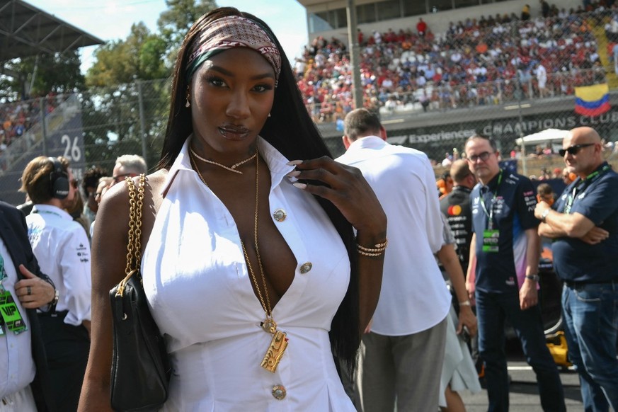 French singer Aya Nakamura poses on the starting grid prior to the Italian Formula One Grand Prix at the Autodromo Nazionale Monza circuit, in Monza, northern Italy, on September 7, 2025. (Photo by Ma ...