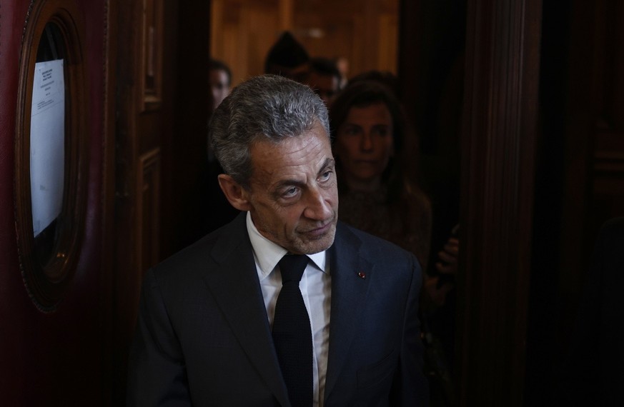 epa10633290 Former French President Nicolas Sarkozy exits the courthouse after appeal court upheld his corruption conviction, Paris, France, 17 May 2023. French appeal court upheld a three-year prison ...