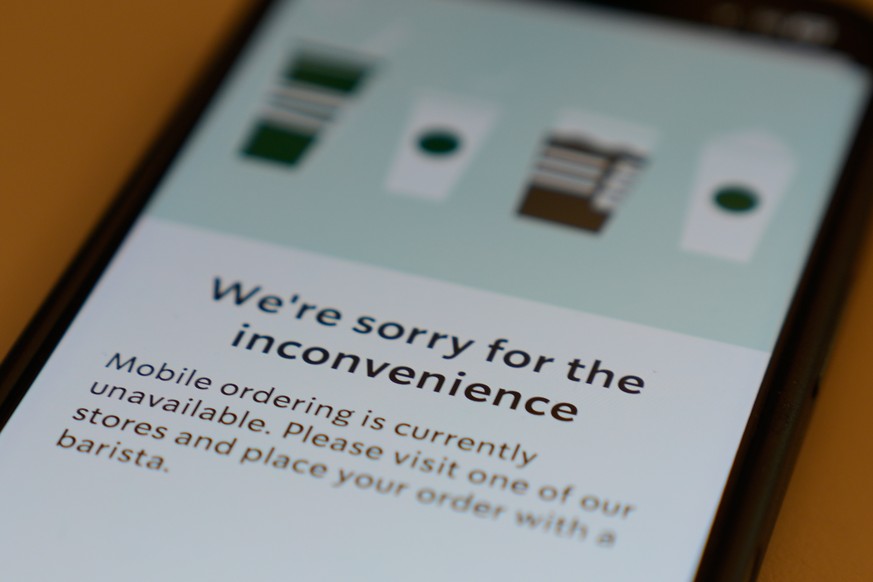 A Starbucks mobile app shows that the mobile ordering is unavailable during the Amazon Web Services outage, Monday, Oct. 20, 2025, in Chicago. (AP Photo/Kiichiro Sato)
Amazon Web Outage