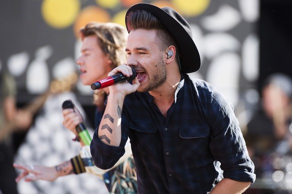 FILE - One Direction members, from right, Liam Payne and Harry Styles perform on ABC&#039;s &quot;Good Morning America&quot; at Rumsey Playfield/SummerStage on Tuesday, Aug. 4, 2015, in New York. (Pho ...