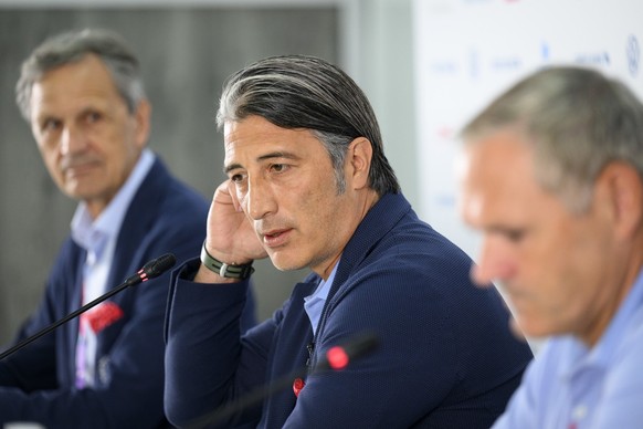 From left, Switzerland&#039;s soccer federation president Dominique Blanc, Switzerland&#039;s head coach Murat Yakin, and Switzerland&#039;s national soccer teams director Pierluigi Tami speak during  ...