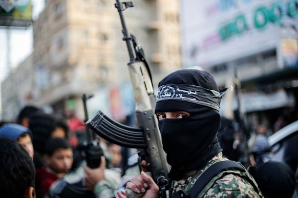 GAZA, PALESTINE - 2020/02/17: A Palestinian activist from the Al-Nasser Salah Al-Din Brigades holds a weapon during an anti-Israel military parade in Khan Yunis, southern Gaza Strip.
Al-Nasser Salah A ...