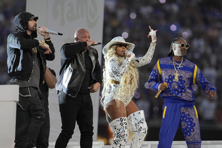 Eminem, from left, performs with Dr. Dre, Mary J. Blige and Snoop Dogg during halftime of the NFL Super Bowl 56 football game between the Los Angeles Rams and the Cincinnati Bengals Sunday, Feb. 13, 2 ...