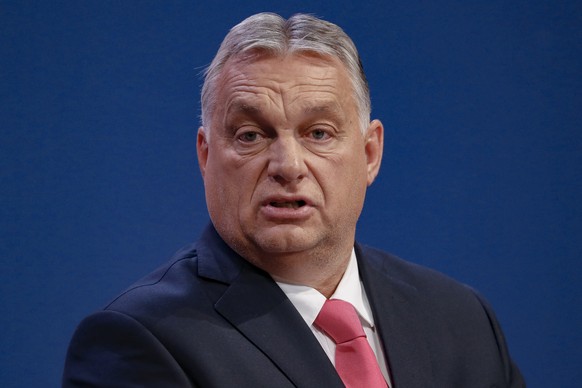 Hungarian Prime Minister Viktor Orban speaks during a joint press conference with French far-right leader Marine le Pen in Budapest, Hungary, , Tuesday, Oct. 26, 2021. (AP Photo/Laszlo Balogh)