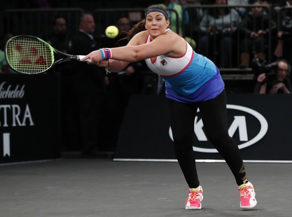 Marion Bartoli, of France, stretches for a return during the first round of the Tie Break Tens tournament against Serena Williams at Madison Square Garden, Monday, March 5, 2018, in New York. (AP Phot ...