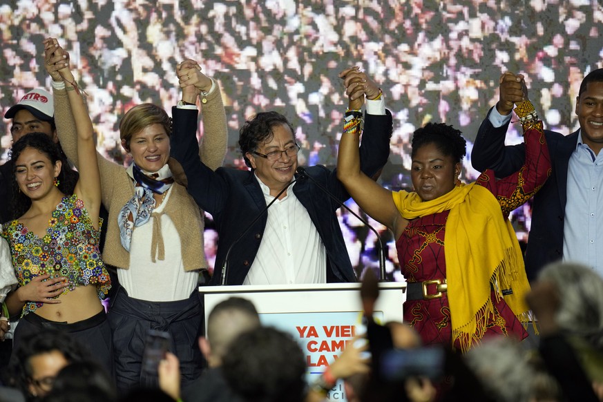 Presidential candidate Gustavo Petro, center, and his running mate Francia Marquez, at his right, with the Historical Pact coalition, stand before supporters with Marquez&#039;s wife Veronica Alcocer, ...