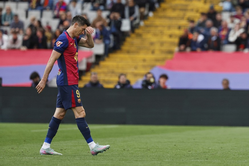 Barcelona&#039;s Robert Lewandowski reacts during a Spanish La Liga soccer match between Barcelona and Celta de Vigo at the Lluis Companys Olympic stadium in Barcelona, Spain, Saturday, April 19, 2025 ...