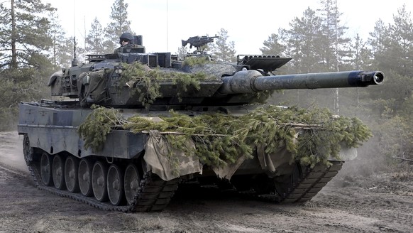 A Leopard battle tank of the Armoured Brigade is seen during the Army mechanised exercise Arrow 22 exercise at the Niinisalo garrison in Kankaanp&#039;&#039;, Western Finland, on May 4, 2022. Finland  ...