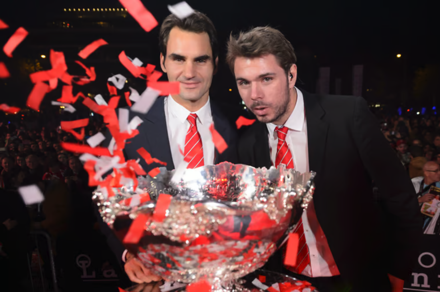 Stan Wawrinka et Roger Federer lors de la réception suivant leur victoire en Coupe Davis à Lausanne, en 2014.