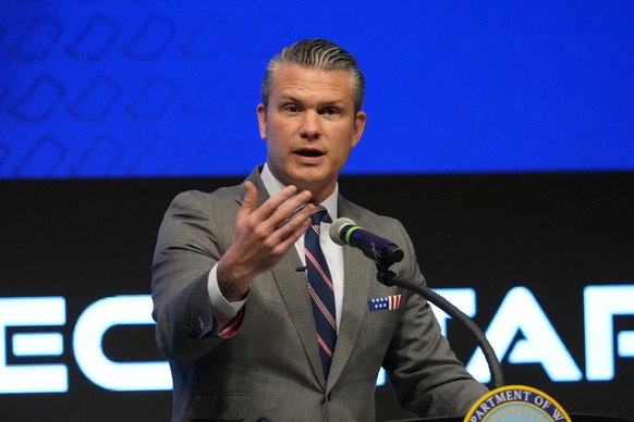 Defense Secretary Pete Hegseth speaks during the 4th annual Northeast Indiana Defense Summit at Purdue University Fort Wayne, Wednesday, Nov. 12, 2025, in Fort Wayne, Ind. (AP Photo/Darron Cummings)
H ...