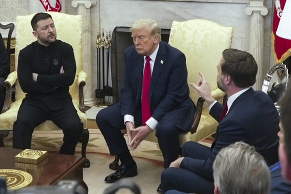 FILE - Vice President JD Vance, right, speaks with Ukrainian President Volodymyr Zelenskyy, left, as President Donald Trump listens in the Oval Office at the White House, Feb. 28, 2025, in Washington. ...