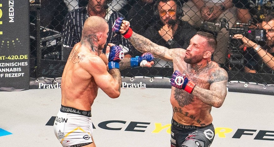 28.06.2025, Kampfsport, GER, Herren, Mixed Martial Arts, MMA, Oktagon 73, Christian Eckerlin /Deutschland - Robert Pukac Slowakai Christian Eckerlin Deutschland, re. gegen Robert Pukac Slowakai, li. H ...