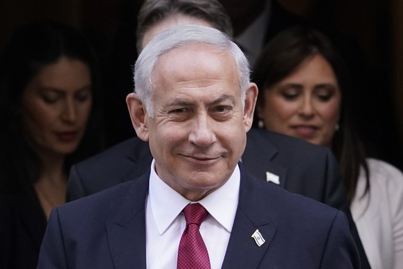 Israeli Prime Minister Benjamin Netanyahu leaves 10 Downing Street after a meeting with Britain&#039;s Prime Minister Rishi Sunak in London, Friday, March 24, 2023.(AP Photo/Alberto Pezzali)