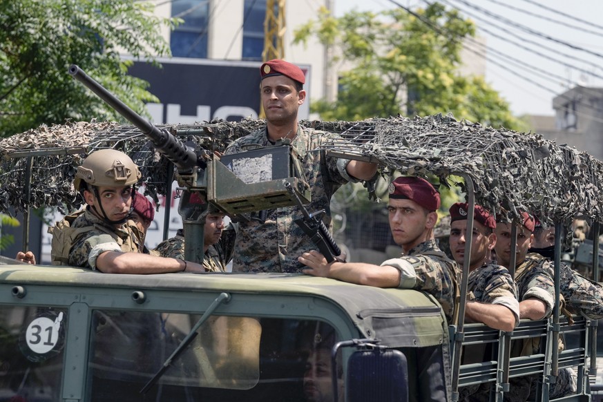 Lebanese special forces sit in their vehicle as they patrol on a road that leads to the U.S. Embassy in Aukar, a northern suburb of Beirut, Lebanon, Wednesday, June 5, 2024. A gunman was captured by L ...