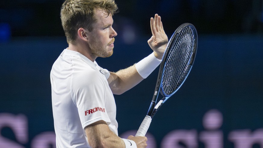 Switzerland&#039;s Remy Bertola cheers after winning his qualifying match against France&#039;s Adrian Mannarino at the Swiss Indoors tennis tournament at the St. Jakobshalle in Basel, Switzerland, on ...