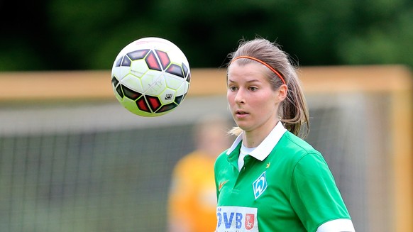 BREMEN, GERMANY - MAY 25: Marie-Louise Eta of Bremen plays the ball during the Women's 2nd Bundesliga match between SV Werder Bremen and BV Cloppenburg on May 25, 2015 at Stadion Platz 12 in Brem ...