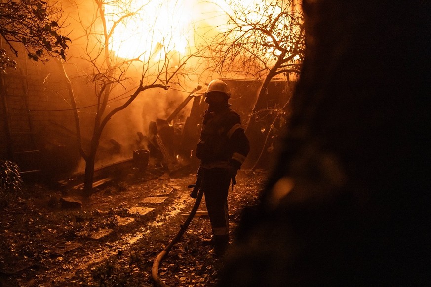 Russian Forces Launch Massive Drone Attack - Kharkiv Ukrainian firefighters work to extinguish a fire following an overnight Russian drone strike in Kharkiv on November 3, 2023. Russia launched a mass ...